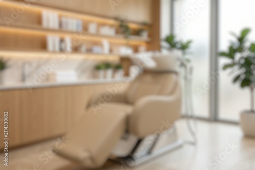 Blur image of a modern salon hair washing station with a comfortable shampoo chair and elegant interior.