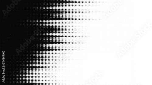 Abstract halftone pattern with black dots fading into