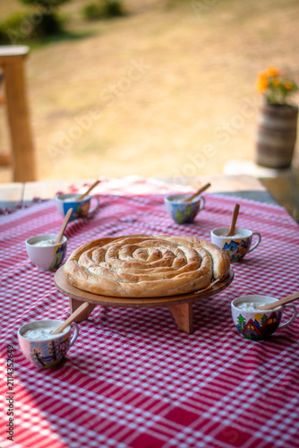 Quadro su tela Traditional Montenegrin cheese pie and sour milk