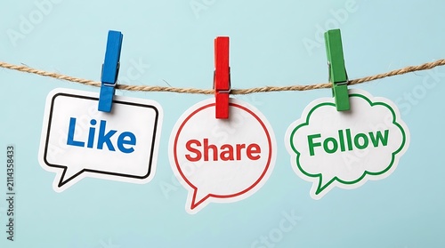 Three speech bubbles on string with like share follow text held by clothespins