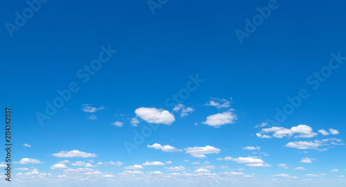 Blue Sky background with tiny Clouds. Panorama background