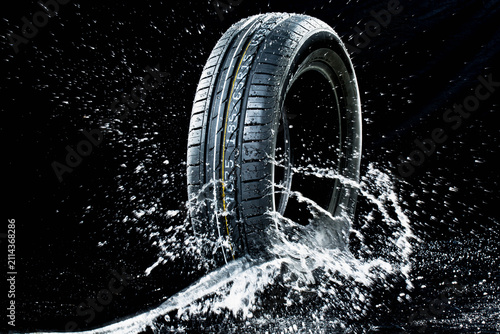 Car tyre in wetness