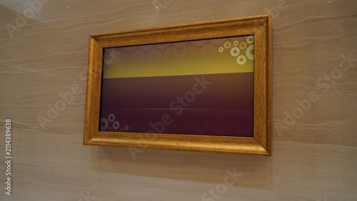 Perspective View Golden Wooden Picture Frame Mounted on Wall with Abstract Pattern Graphic Screen Display Mockup