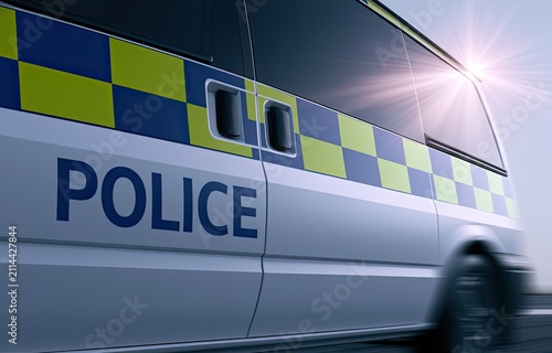 A police van with reflective markings speeds by with a sunburst effect