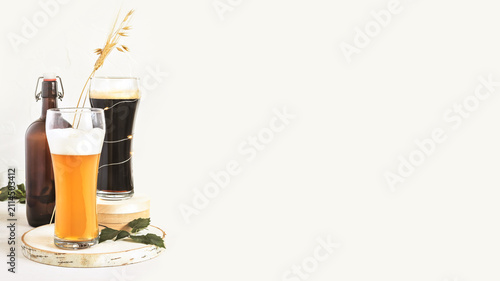 Konstfotografi Light and Dark Craft Beer with Bottle on White Background with Copy Space, for B