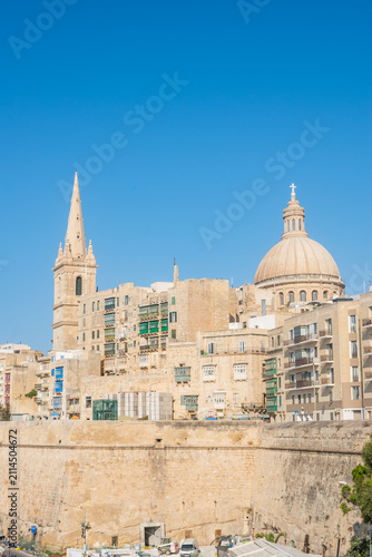 City walls and architecture with the basilica's dome and bell tower, Valletta MALTA