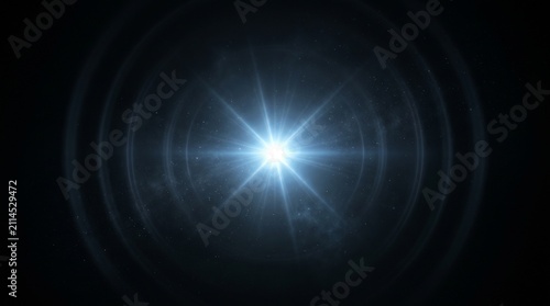 Photography Brilliant blue starburst light flare glowing intensely in dark space surrounded