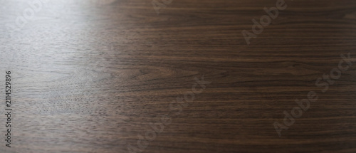 Dark Brown Walnut Wood Table Surface with Natural Grain Texture