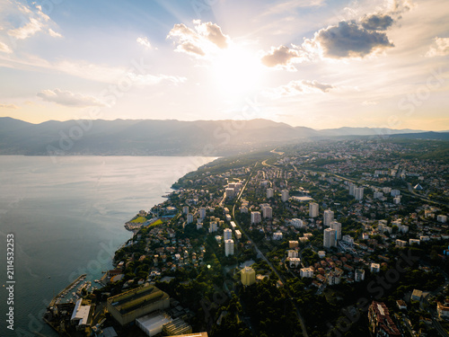 Aerial drone view of Rijeka cityscape with sunny summer sky in Croatia
