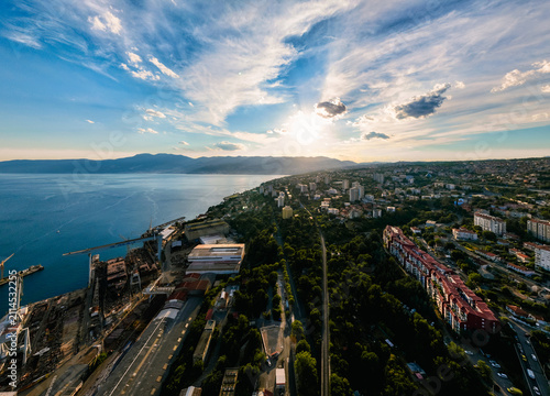 Rijeka harbor and modern city architecture aerial view on sunny day