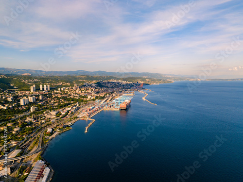 Aerial perspective of Rijeka seaside cityscape and harbor during summer

