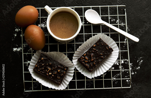 delicious homemade chocolate brownies  , arranged on wire cooling rack. Taken on a white background.