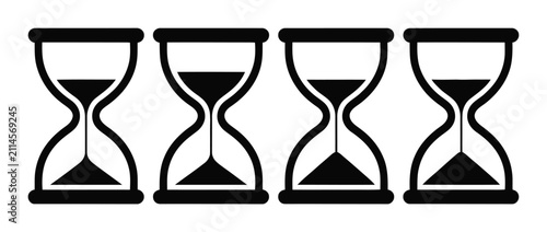 Foto Cuatro relojes de arena negros que representan diferentes etapas del paso del ti