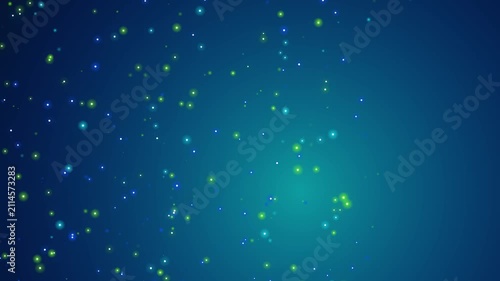 Abstract blue background with floating green glowing particles