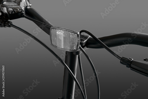 Black bicycle handlebar.