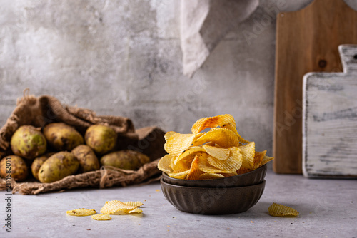 Картината върху платно Crispy fresh potato chips, junk food
