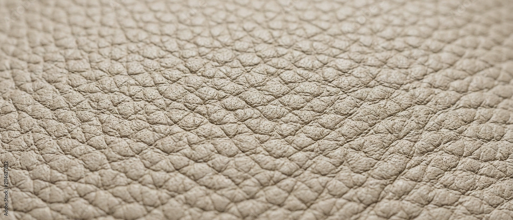 Naklejka premium Macro Shot of Luxury Beige Grained Leather Surface