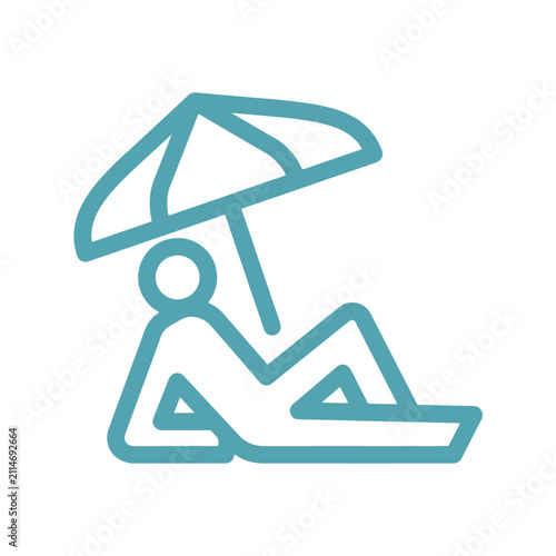 Person relaxing under beach umbrella for vacation leisure.