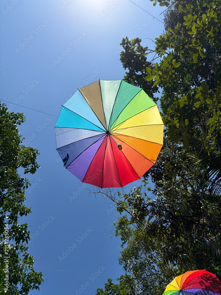 Fototapeta premium colorful umbrella in the sky