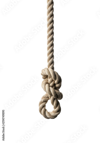 Ultra close-up macro shot of a thick, beige natural hemp fiber rope tied in a figure-eight follow-through knot, dramatic side lighting on a transparent background. Concept of resilience and safety