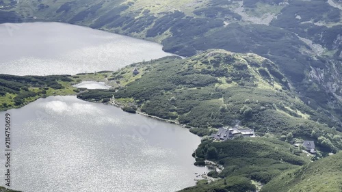 Scenic mountain lake and alpine huts in the Polish Tatra Mountains