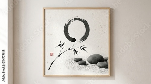 A black ink circle is centered on a beige background, accompanied by a bamboo branch and a few smooth stones. The artwork evokes a sense of tranquility and balance.