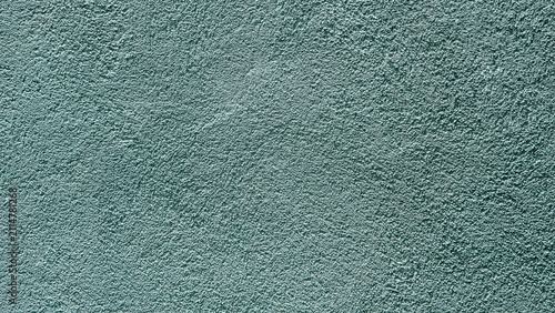 Fotografía Abstract light blue- green stucco wall texture background with a subtle rough finish and copy space