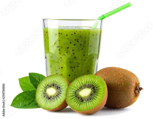 A refreshing glass of green smoothie with kiwi slices and leaves
