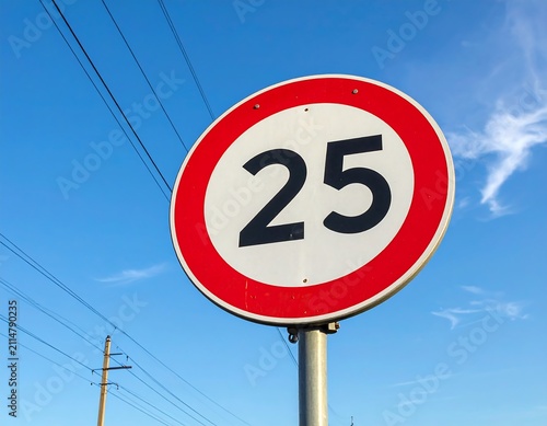 A red and white speed limit sign displaying the number 25