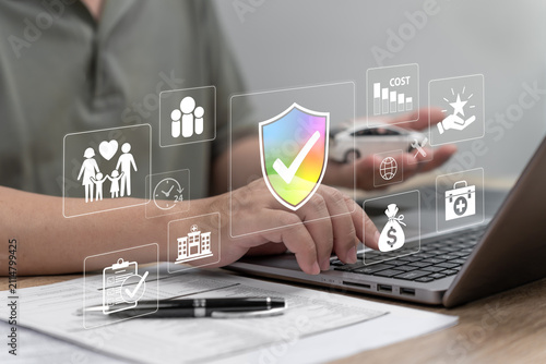 Insurance Officer Managing Car Insurance Claims on Laptop, Policy Administration, Cost Control, Claim Processing, Customer Support, Benefits Management, Financial Protection 24 Hour Insurance Service