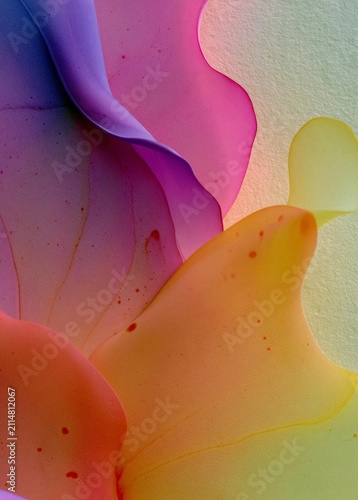 Abstract close-up of a flower petal. the petal is made up of different shades of pink, purple, and yellow, creating a gradient effect.