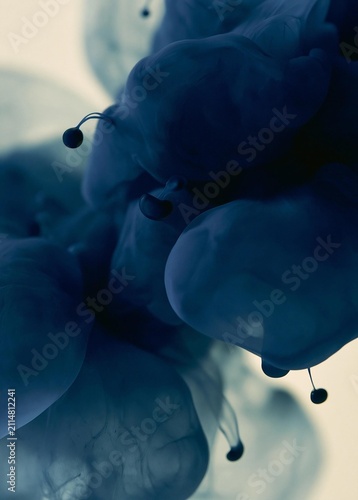 Abstract digital art piece that appears to be a close-up of a group of blue ink or water droplets.