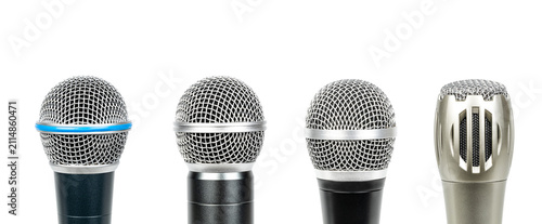 Close up, set of four microphone heads isolated on white background.