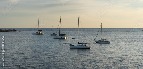 Sailboats on the sea at sunset by Ile des Embiez, France