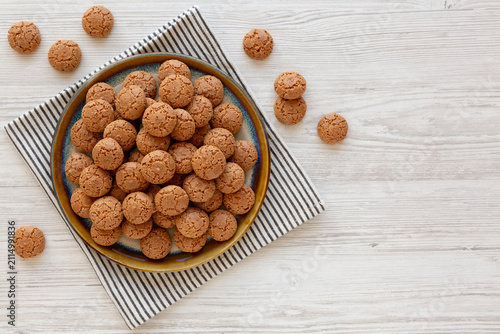 Homemade Italian Almond Amaretti Cookies on a Plate, top view. Copy space.