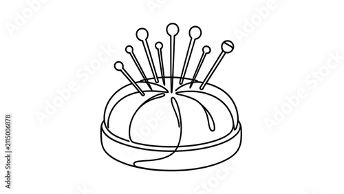 Pincushion with needles on white background.