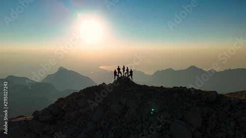 Peak Standing Woman Sunrise Reveal