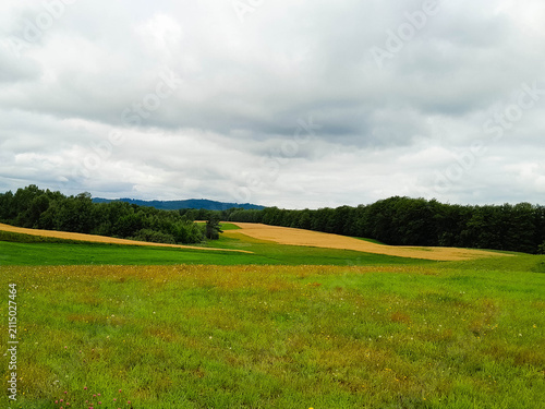 Dark clouds over field in Kashubia