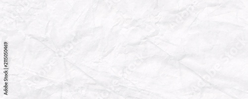 Clean bright white crumpled paper texture backdrop with subtle folds and soft highlights for minimalist graphic design projects requiring professional light surface.