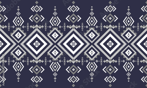 Seamless navy blue, gray and white ethnic geometric tribal pattern featuring symmetrical diamond motifs, ikat inspired ornamental elements and traditional boho textile design for fabric.
