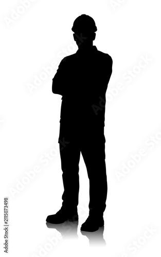 Confident construction worker silhouette wearing a protective hard hat and standing with crossed arms, full length figure isolated on a white background with soft floor reflection and copy space