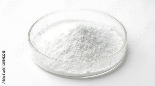 A close up view of white allantoin powder in a clear glass petri dish against a clean white background used in pharmaceutical and cosmetic industry
