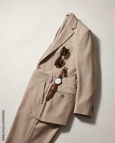 Beige Tailored Blazer with Brown Leather Watch and Tortoiseshell Sunglasses