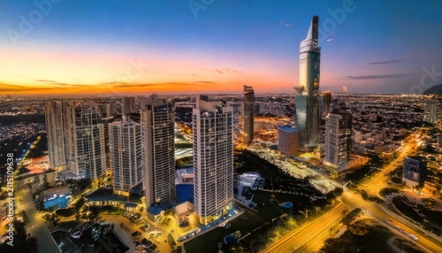 Spectacular Cityscape at Sunset - A Modern Metropolis Illuminated.