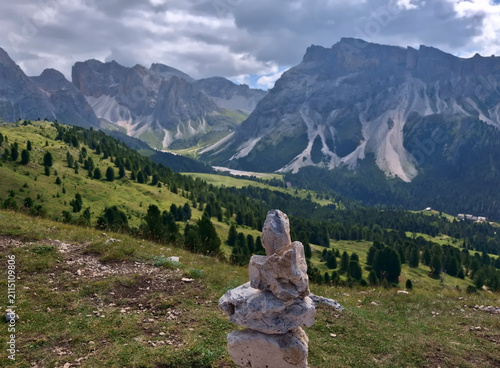 scenic view of the wonderful Dolomite peaks in summer between rocks and valleys