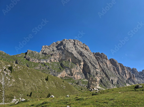 scenic view of the wonderful Dolomite peaks in summer between rocks and valleys