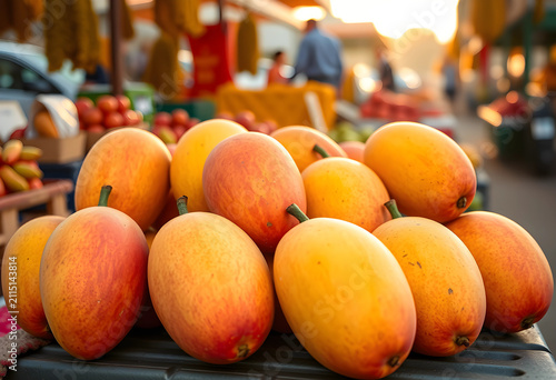 Fresh ripe mangoes on displ...