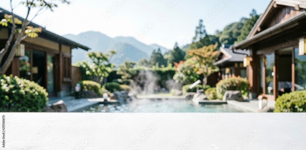 Fototapeta premium Traditional Japanese Onsen with Steaming Pool and Mountain View for Relaxation Concept