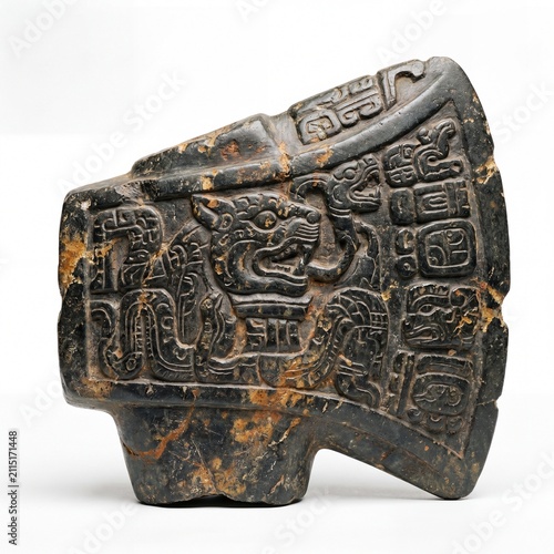 Ancient Dark Stone Axe Head Featuring Intricate Mayan Glyphs and a Carved Jaguar Deity Motif.
