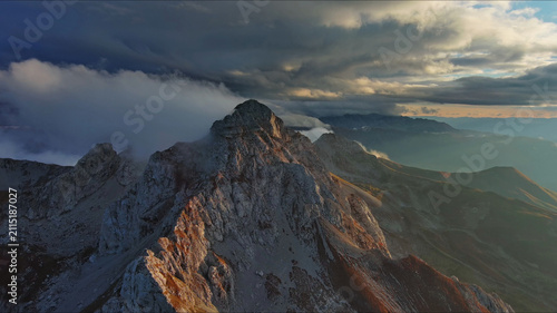 Aerial view of amazing rocky mountains at sunset